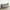 Gray, variant on Modern Futon Sofa Bed - Compact Design for Small Spaces - Convertible Futon with Linen Fabric for Premium Comfort - Ideal Guest Couch - Stylish & Durable, Supports up to 750 lbs. - Tangerine