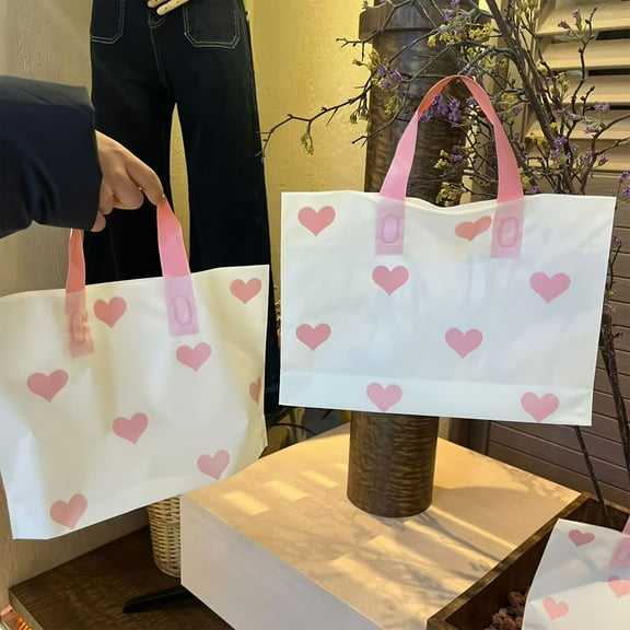 50 Pcs Premium Plastic Gift Bags with Pink Heart Patterns - 11.81x7.87x3.15 in, Pink - Handle, Ideal for Birthday Parties, Weddings & Party Supplies