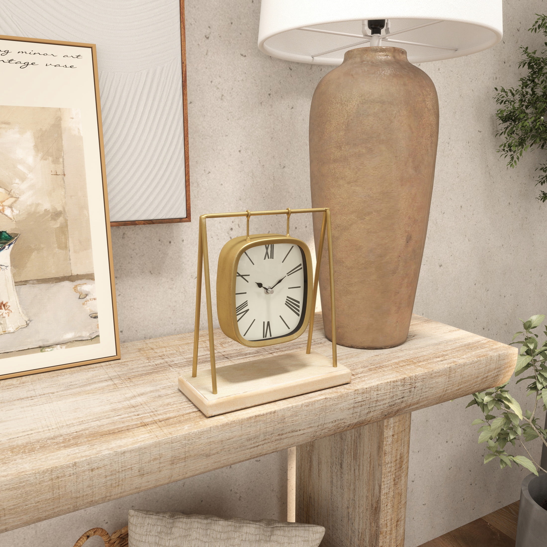DecMode 11" Gold Metal Suspended Hanging Clock with Wood Base
