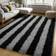 thumbnail image 1 of Alfombra Zentavio, 152 x 244 cm, felpa suave, negra y gris, 1 of 8