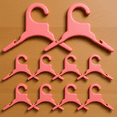thumbnail image 1 of FENGGUIQU 10Ud Colgador De Ropa De Mascotas Con Antideslizante Material Plástico Rosa, 1 of 6