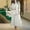 White, variant on Babcutegg Women’s Solid Color Casual Two-Piece Set – Long Sleeve Button-Up Blouse with Pockets & Wide-Leg Midi Skirt White Size 5XL