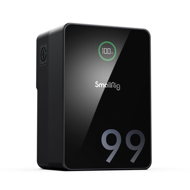 Batería V-Mount SMALLRIG VB99 Pro de 99 Wh/6800 mAh con PD bidireccional de 100 W, vista frontal 3/4 con carcasa negra de aleación y PC y cubierta acrílica brillante; pantalla TFT a color muestra 100% y gran número "99" frontal; perfil compacto con botón lateral y puertos USB-C, USB-A y D-Tap visibles; diseñada para alimentar cámaras, monitores y laptops, y adecuada para alimentar luces LED pequeñas durante rodajes.
