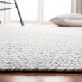 thumbnail image 5 of SAFAVIEH Braided Rishika Solid Machine Washable Reversible Area Rug, Silver/Grey, 3' x 3' Round, 5 of 10