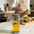 thumbnail image 2 of Botella de aceite de vidrio con alto contenido de borosilicato (1 unidad, con escala) | Esencial for cocina, barbacoa y picnics al aire libre., 2 of 2