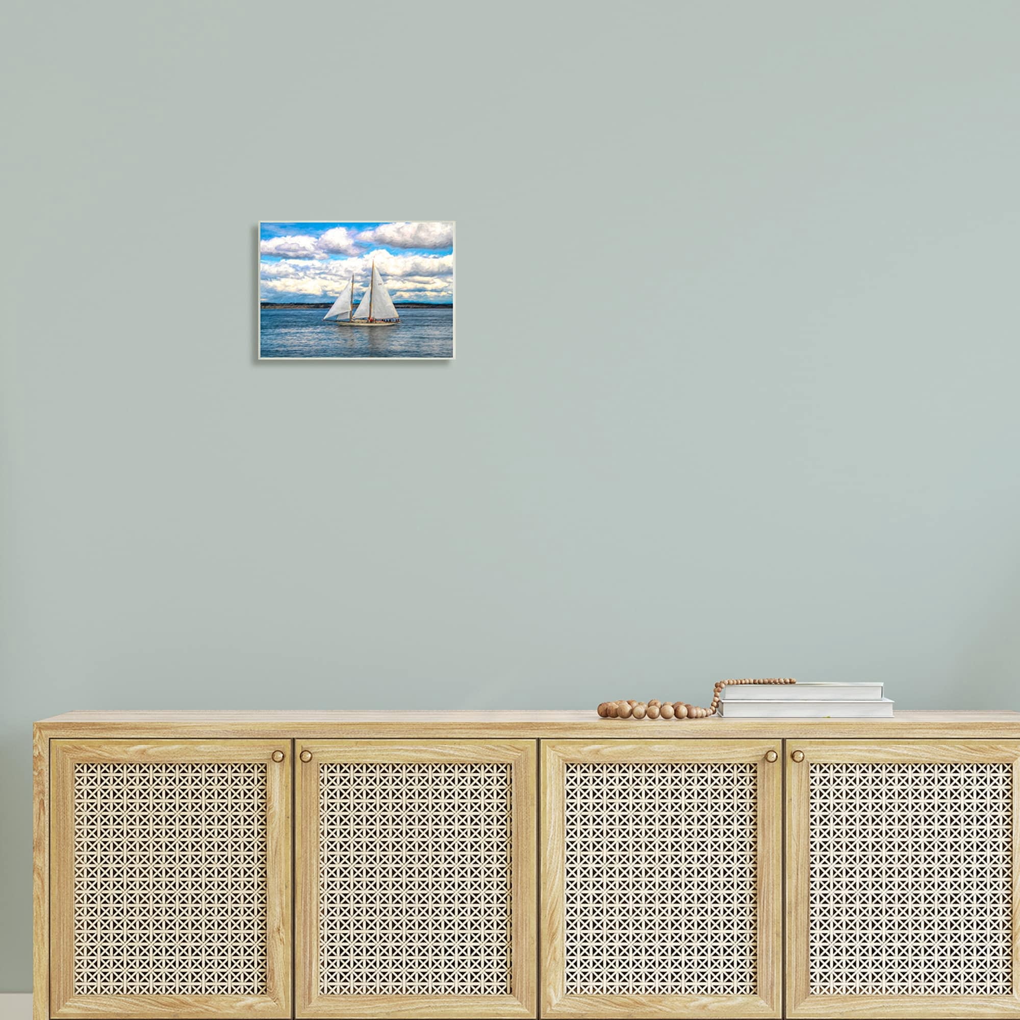 Stupell Industries Quaint Sailboat Floating Ocean Fluffy White Clouds Wood Wall Art, 15 x 10, Design by Nan