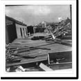 thumbnail image 2 of Historic Framed Print, [Aftermath of hurricane and flood in Galveston, 1900: scene of devastation at 20th & M 1/2 St. at dawn, Sept. 9th; dead body lying by rubble], 17-7/8" x 21-7/8", 2 of 9