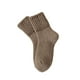 thumbnail image 2 of Calcetines lisos de media pantorrilla, diseñados para hombres y mujeres que valoran la durabilidad y un toque navideño. Calcetines de nailon., 2 of 3