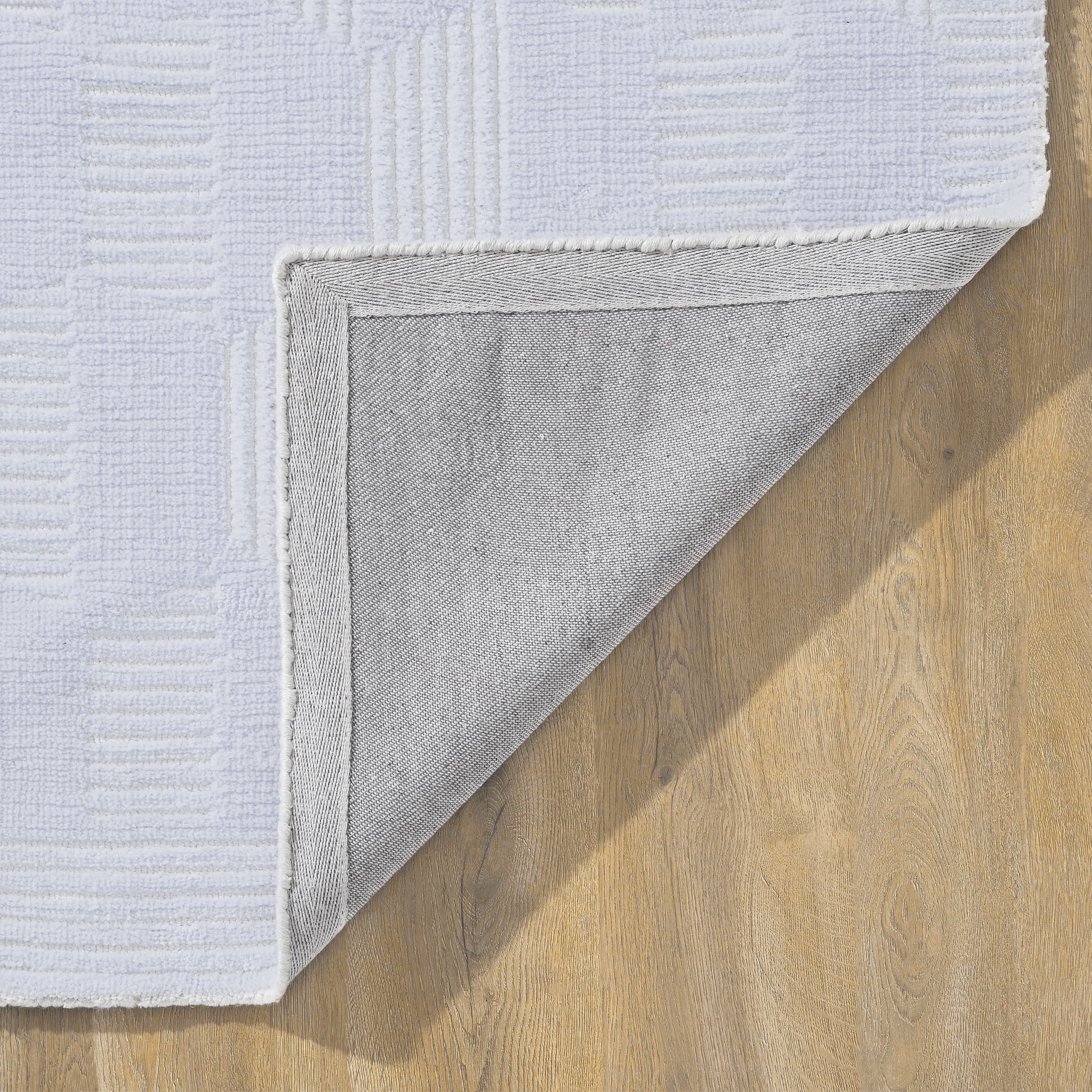 Beautiful Tufted Blue Geometric Stripe Indoor Area Rug by Drew Barrymore, 9' x 12'