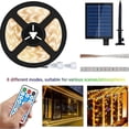 thumbnail image 2 of Tira de LED con energía solar para exteriores, tira de LED impermeable IP67 de 5 m 280 LED, luces LED de color blanco cálido con control remoto, 8 modos de iluminación 2835 SMD Fairy Lig, 2 of 5