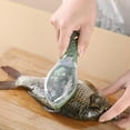thumbnail image 1 of Product Category Peeler/ Manual Fish Scale Remover with Lid for Household Kitchen Use Durable Stainless Steel Build Easy Grip Handle Efficient Debris-Free Cleaning, 1 of 3