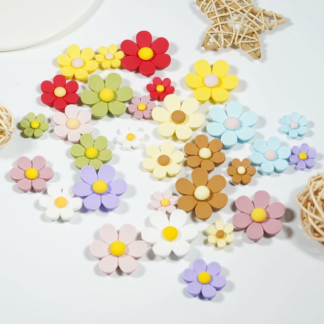 Ruiboury 30pcs strong fridge magnets in a variety of flower designs, featuring vibrant colors like red, yellow, green, blue, and purple. These decorative magnets are displayed on a white surface, showcasing their stylish and practical use for fridges, lockers, or whiteboards. Ideal for adding a touch of charm to kitchens or offices.