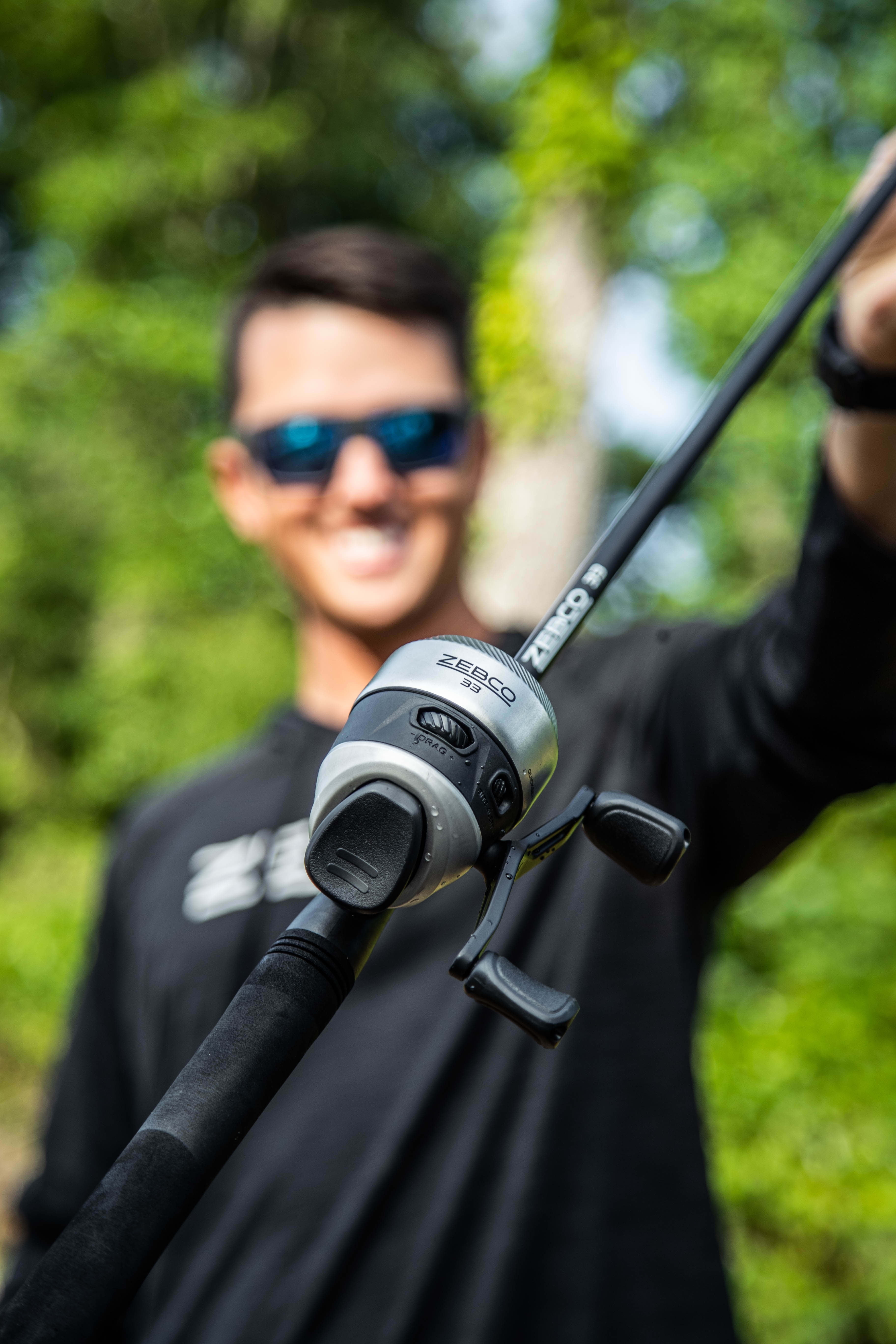 Zebco 33 Spincast Reel and Fishing Rod Combo, 6-Foot 2-Piece Rod; Assortment: Available in Black or Purple