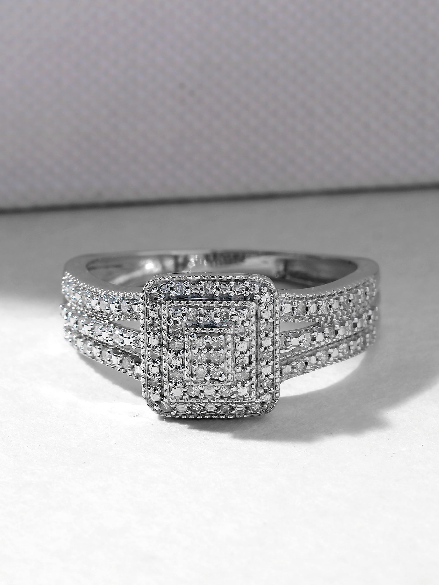 1/6Ct TDW Diamond 10K White Gold Cluster Engagement Ring
