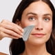 thumbnail image 2 of Masajeador Gua Sha Tweezerman de acero inoxidable, 2 of 6