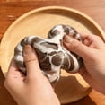 thumbnail image 5 of Squishy Black Chocolate Crunched Stress Ball, Crackling Sensory Fidget Toy for Anxiety Relief, 5 of 6
