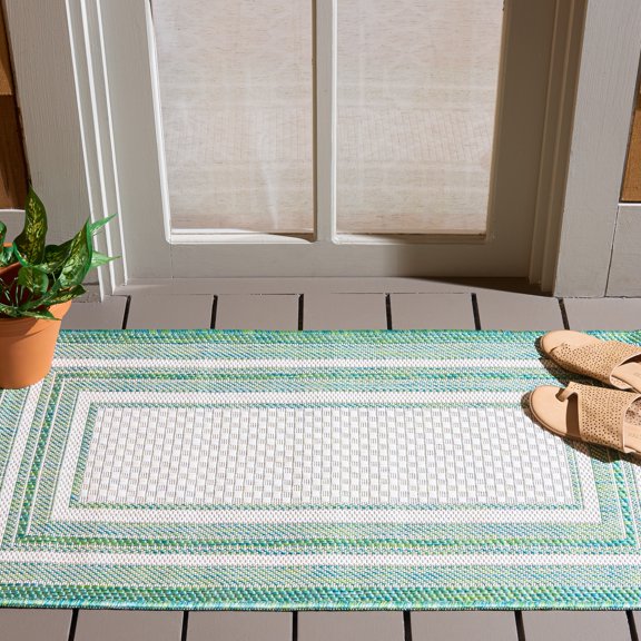 Safavieh Courtyard Ercan Bordered Indoor/Outdoor Area Rug, Ivory/Green, 2' x 3'7"