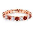 thumbnail image 2 of Gem Stone King 18K Rose Gold Plated Silver Round Red Garnet and White Created Sapphire Eternity Band Ring for Women | 1.50 Cttw | Gemstone Birthstone | Wedding Engagement Anniversary Ring | Size 9, 2 of 6