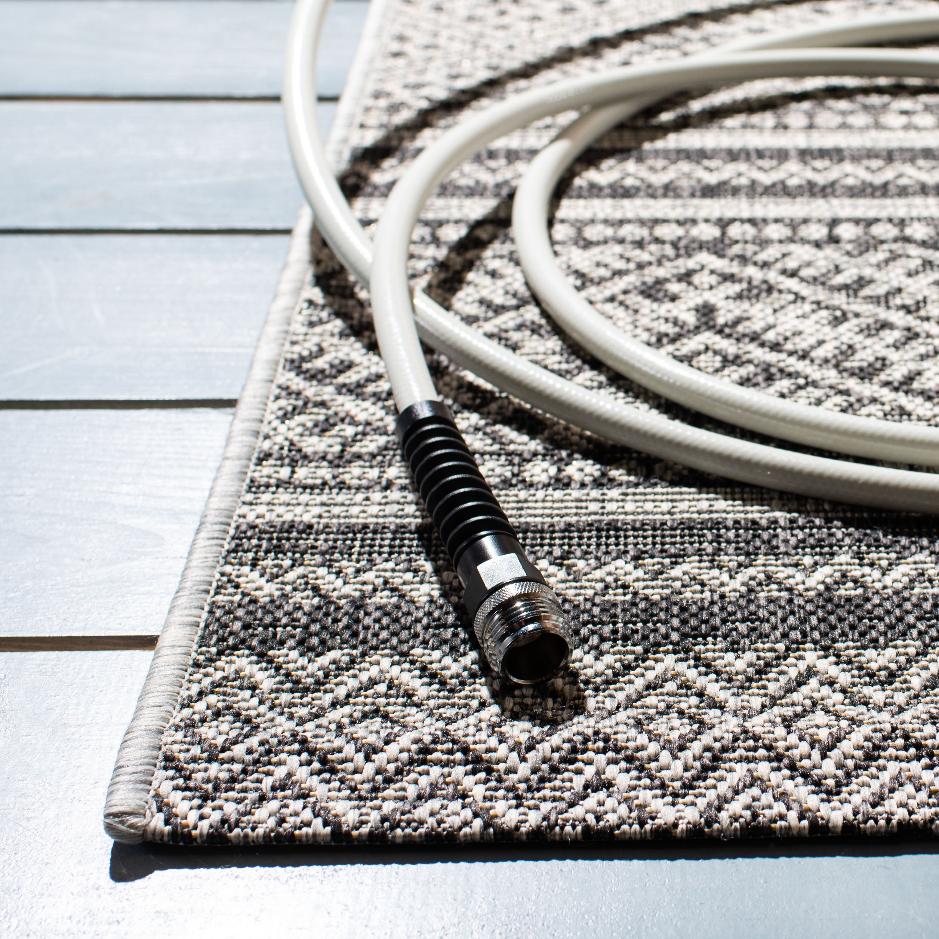 SAFAVIEH Courtyard Eric Geometric Chevron Indoor/Outdoor Area Rug, 5'3" x 7'7", Black/Grey