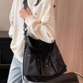 thumbnail image 2 of Nylon crossbody bag with multiple pockets and adjustable straps for added comfort., 2 of 5
