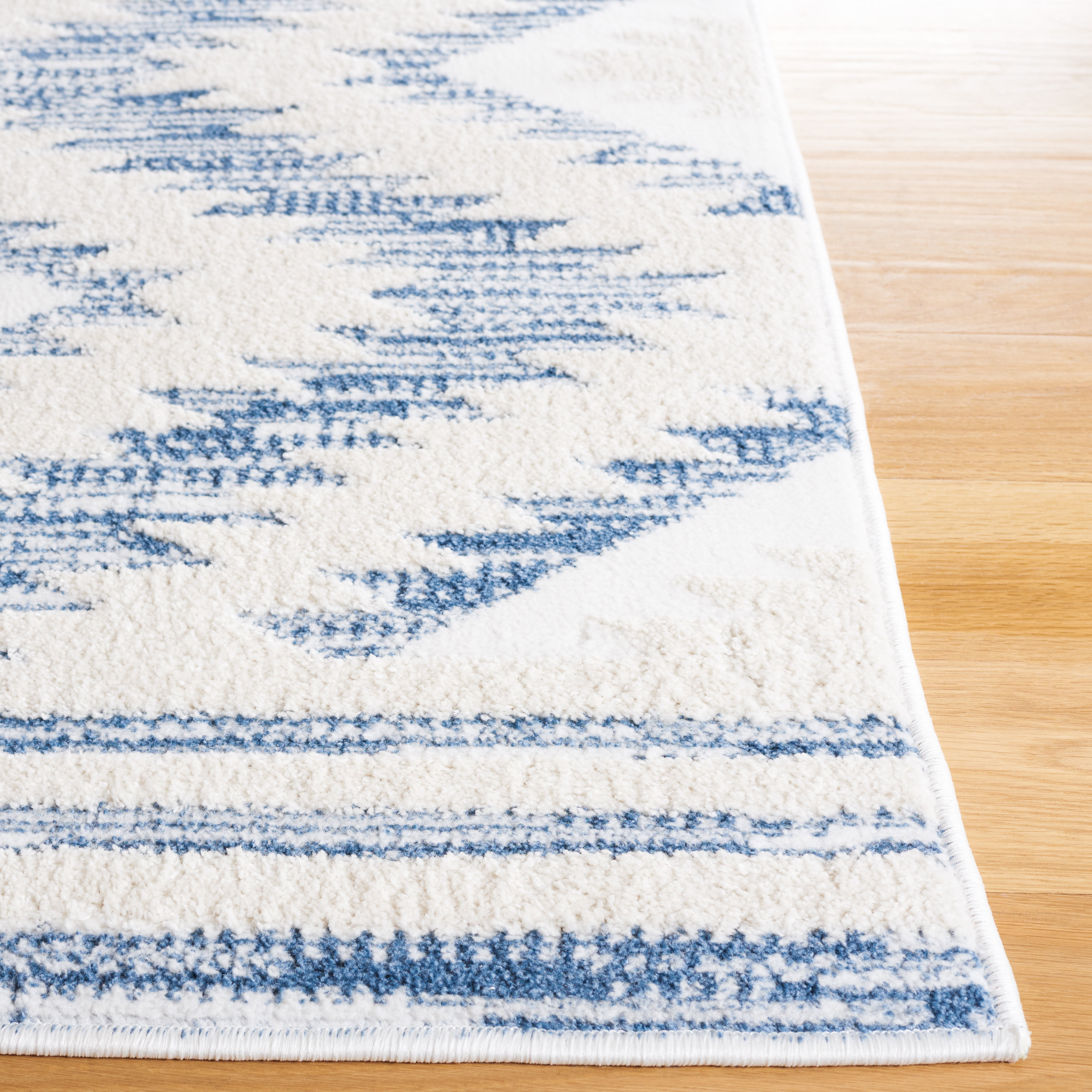 SAFAVIEH Alamo Stamen Geometric Area Rug, Ivory/Blue, 5'3" x 7'6"