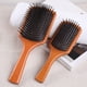 thumbnail image 4 of Peine de madera para peluquería con cojín de aire, peine para rizar el cabello, peine para el cuero cabelludo, peine de madera maciza para masajes, peine cuadrado para pan con letras, 4 of 5