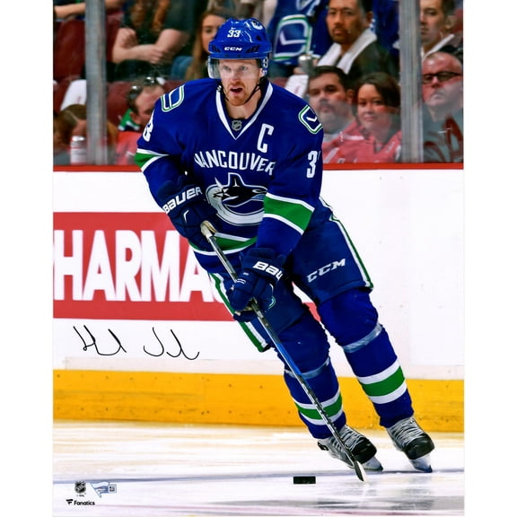 Henrik Sedin Vancouver Canucks Autographed 16" x 20" Blue Jersey Skating Photograph - Fanatics Authentic Certified