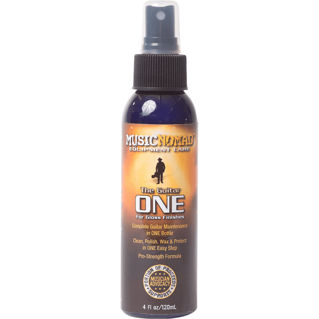 limpiador para guitarra o bajo music nomad mn103 music nomad nomad the guitar one botella spray transparente 120 ml; vista frontal centrada de envase azul con etiqueta naranja y tapa negra con atomizador, indica limpieza, pulido, encerado y protección UV en un solo paso, fórmula pro fuerza, ideal para mantenimiento de instrumentos y acabados brillantes.
