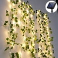 thumbnail image 2 of Guirnalda de luces solares para exteriores de 10 m con 100 LED, guirnalda de luces de hiedra artificial para jardín, patio, hogar, celebraciones al aire libre y decoración de bodas., 2 of 5