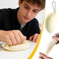 thumbnail image 1 of Juguete antiestrés con forma de dumpling | Llavero antiestrés para aliviar la ansiedad y mejorar la concentración | Juguete para apretar que estimula los sentidos, 1 of 9