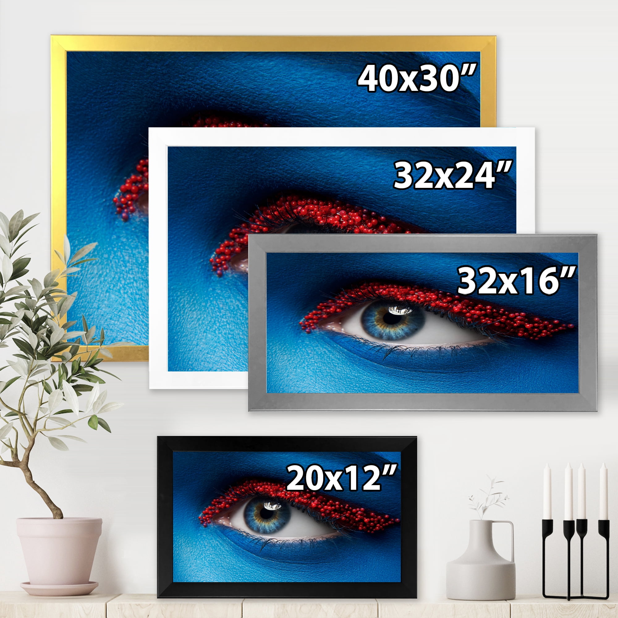 Designart 'Woman Eye With Blue Paint On Face & Red Balls' Modern Framed Art Print