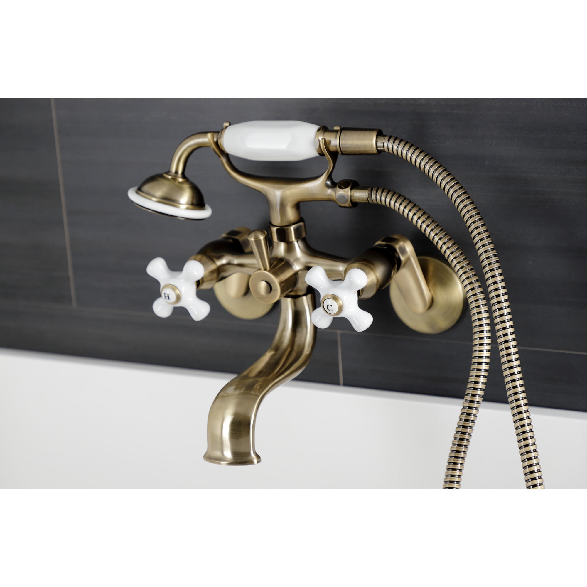 Kingston Brass KS226PXAB Kingston Three-Handle 2-Hole Wall Mount Clawfoot Tub Faucet with Hand Shower in Antique Brass