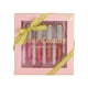 thumbnail image 1 of Set de brillo labial Juicy Couture, paquete de 4 unidades, bayas, cacao y clementina, sandía, 1 of 6