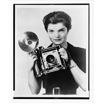 Historic Print, [Jacqueline Kennedy Onassis, half-length portrait, facing front, holding camera], 16" x 20"