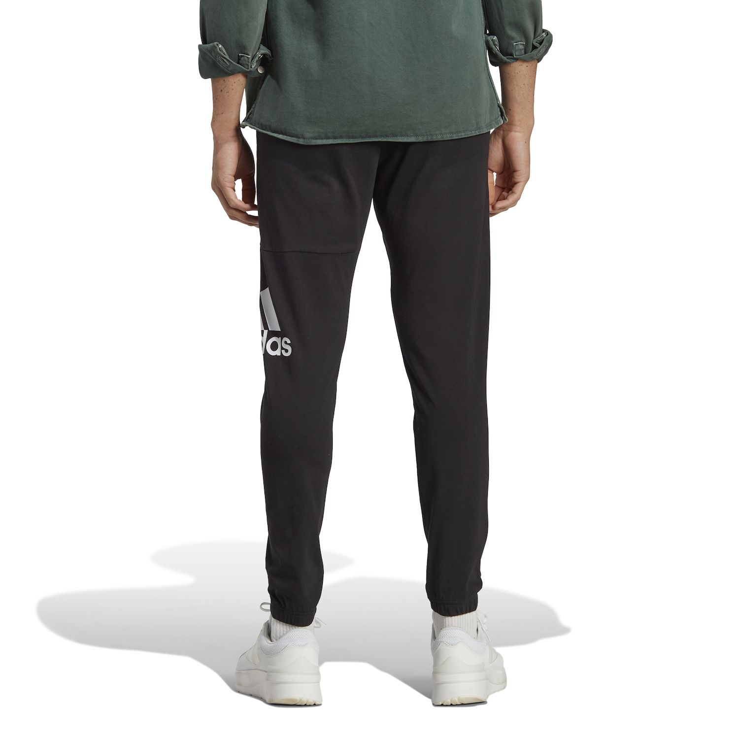 Men's adidas Essentials Badge of Sport Jersey Tapered Pants Color: Black Size: L