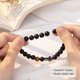 thumbnail image 5 of Pulsera ORISPRE para Hombre 20 cm Ágata Negra Ojo de Tigre con Cruz, 5 of 6