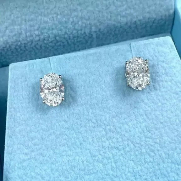 4Ct Lab Created Oval Cut Diamond Solitaire Stud Earrings 14K White Gold Plated