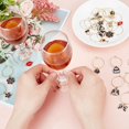 thumbnail image 3 of 24 marcadores de copas de vino esmaltados con forma de lazo floral. Anillos para identificar copas y vasos, ideales para catas de vino y fiestas., 3 of 6
