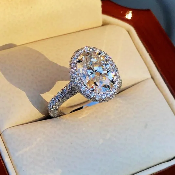 2.00CT Oval Cut Simulated Diamond Halo Cluster Women's Engagement Ring 14K White Gold Plated 925 Silver For Her
