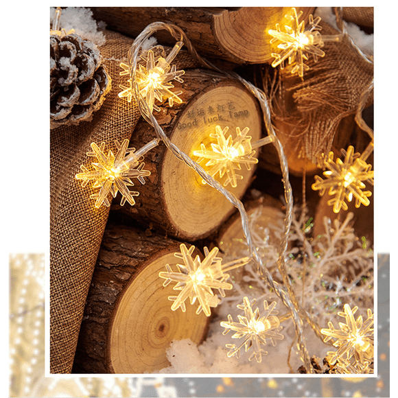 TORUBIA Christmas Lights, Snowflake String Lights 13.2 ft 40 LED Fairy Lights Battery Operated Waterproof for Xmas Garden Patio Bedroom Party Decor Indoor Outdoor Celebration Lighting (Warm Color)