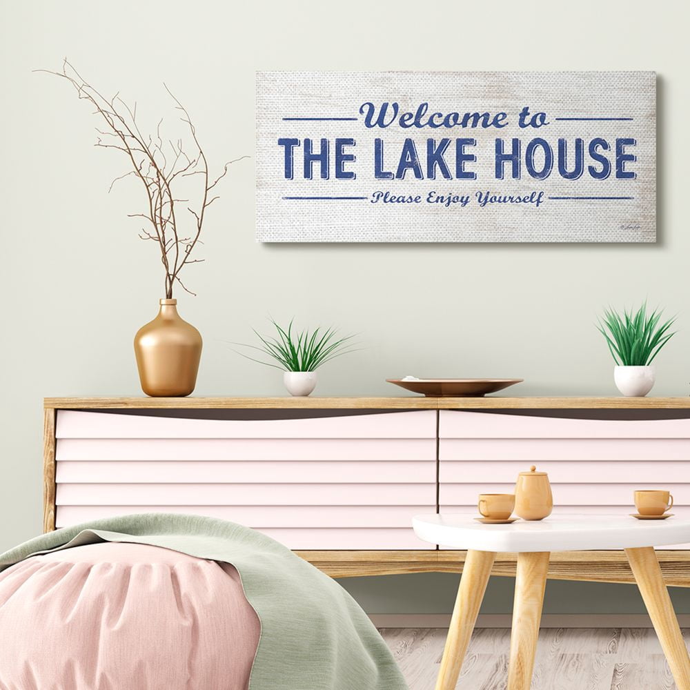 Stupell Industries Lakehouse Welcome Sign Enjoy Yourself Phrase Distressed Design Canvas Wall Art Design by Lauren Rader, 17" x 40"