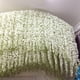 thumbnail image 3 of Wisteria artificial flor de vid de seda flor artificial largo arbusto colgante flores cuerda fiesta en casa decoración de la boda (un paquete de 20), blanco puro Muyoka Hogar, 3 of 6