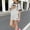 Gray, variant on SGFCWSX Girls 2 Piece Outfits Summer Bow Print Short Sleeve T Shirt Side Stripe Shorts Set for Kids Green Size 10