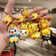 thumbnail image 4 of kendra lindo pikachu llavero par llavero eeveelution llavero pokemon llavero bolsa colgante figura modelo de dibujos animados regalos niños accesible pato cruz vestido llavero, 4 of 4