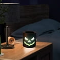 thumbnail image 4 of Halloween Decorations Halloween Cylindrical Evil Pumpkin Lights Glowing LED Electronic Candle Lights Spooky Festival Supplies Halloween Decoration and Gift Black, 4 of 6