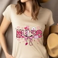 thumbnail image 4 of Nurse Graphic T-Shirt | Pink Bow and Heart Medical Icons Tee, White, Size S, 4 of 6