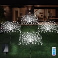 thumbnail image 1 of Luces solares para exteriores, paquete de 4 120 luces LED solares impermeables para fuegos artificiales, 8 modos, luz decorativa para paisaje con estaca y destellos, (blanco frío), 1 of 5