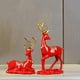 thumbnail image 1 of de Reno nórdico, adornos, escultura, estatuas de ciervo de resina para el hogar, sala de estar, decoración de estantería, , Rojo Macarena Estatua de escultura de ciervo, 1 of 8