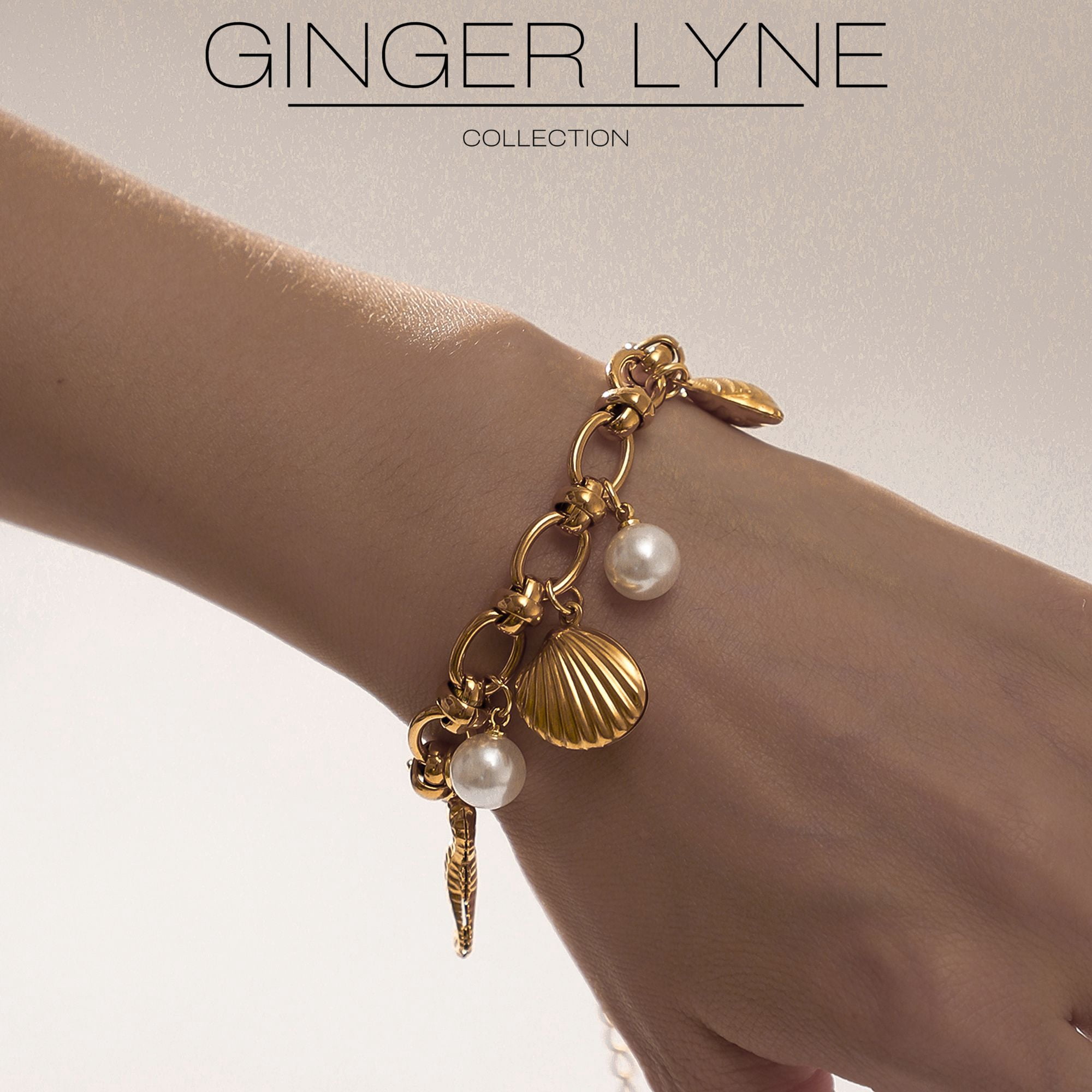 Seashell Charm Bracelet for Women by Ginger Lyne Gold Plated Stainless Steel Pearls Starfish and Shells