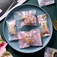 thumbnail image 1 of Bolsa de embalaje de turrón crujiente de copo de nieve, bolsa de embalaje de galletas niu tie, bolsa de dulces, bolsa autosellada sellada a máquina, 1 of 5